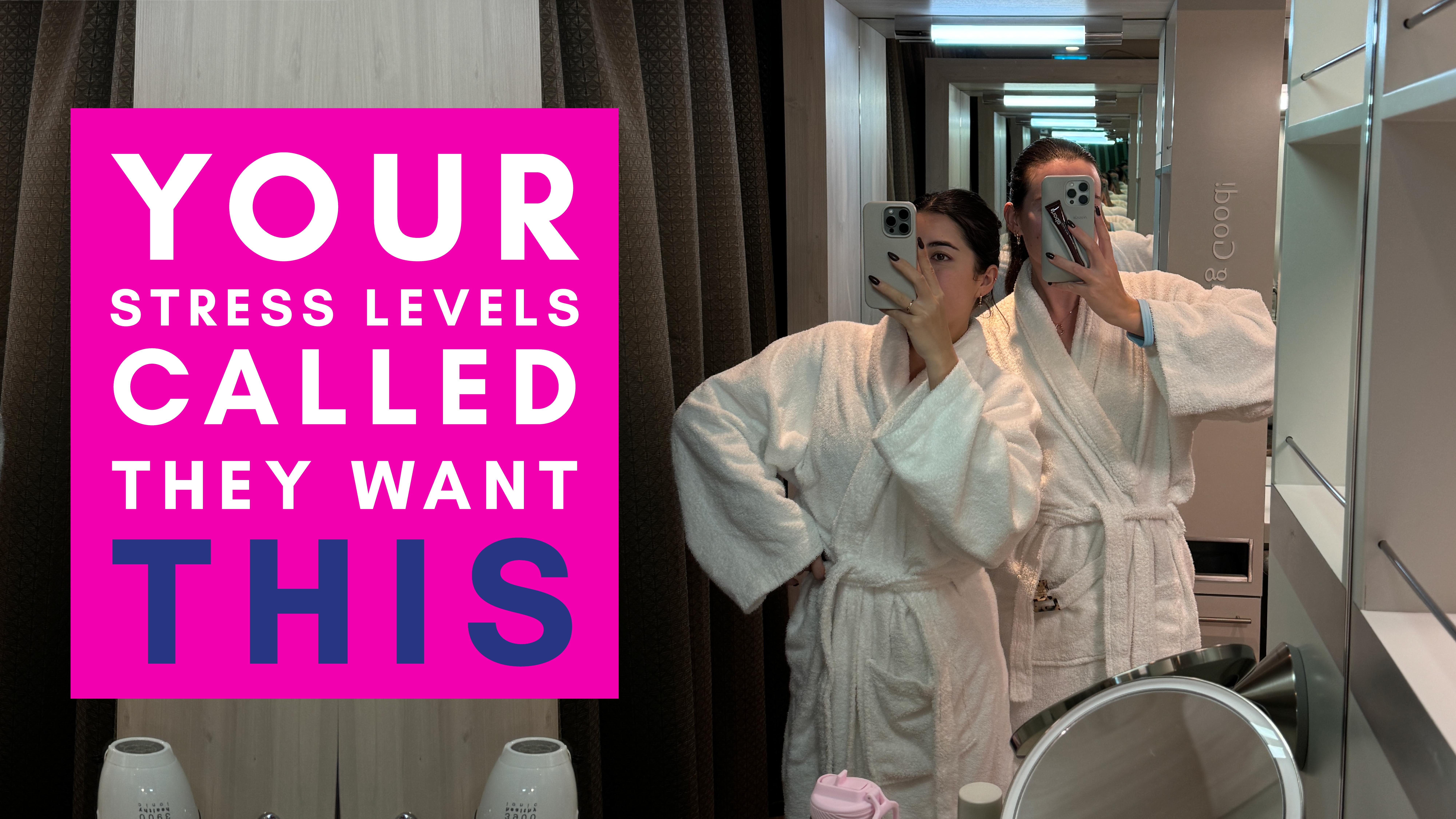 two people in white bathrobes taking mirror selfies